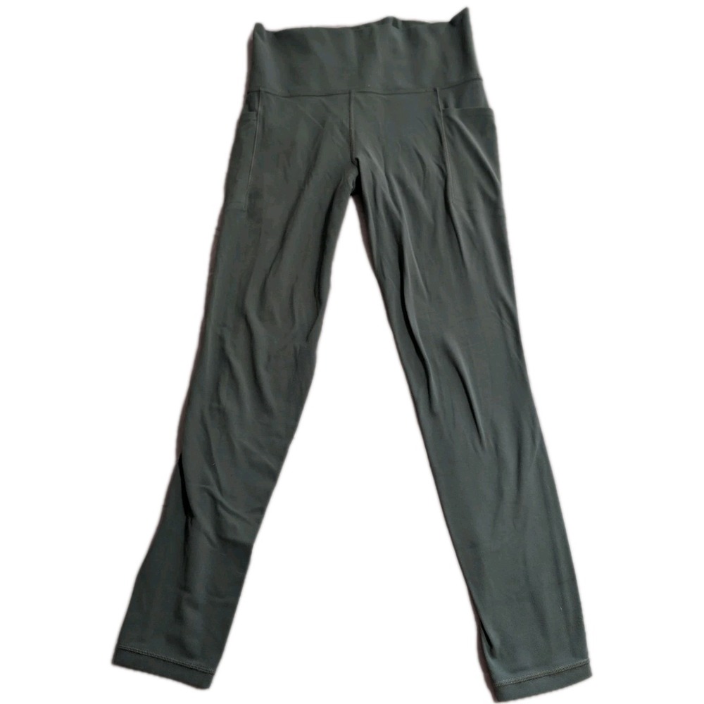 Athleta Salutation Stash Pocket II 7/8 Tight Leggings Green Womens Medium